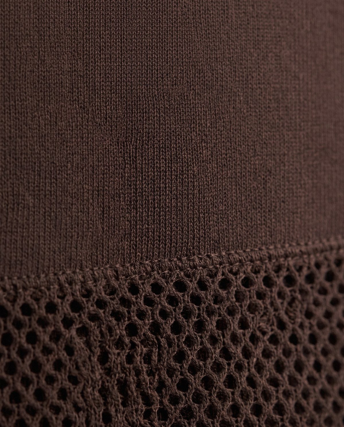 DazeForm fabric close up, showing the interlock knit and the open vent knit